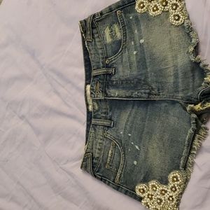 free people jean shorts with beads and wear size 24